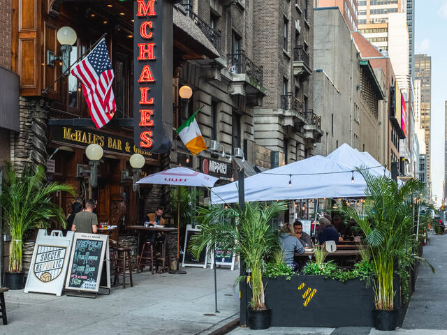 Visit the pubs and restaurants along 51st Street.