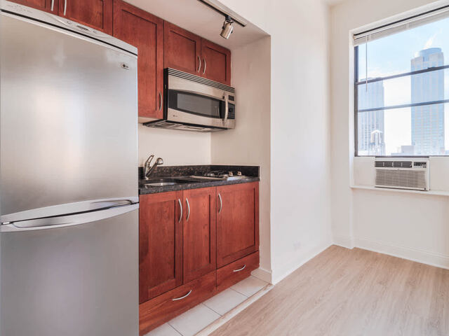 Kitchen with Granite Countertops and Stainless Steel Appliances