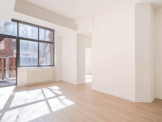 Living Room with Hard Surface Flooring and Patio