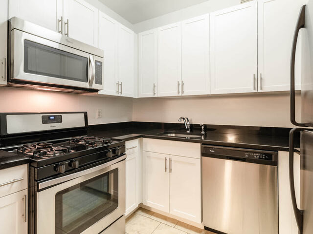 Kitchen with Granite Countertops and Stainless Steel Appliances