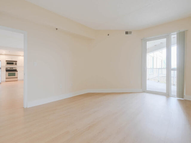 Bedroom with Balcony and Hard Surface Flooring