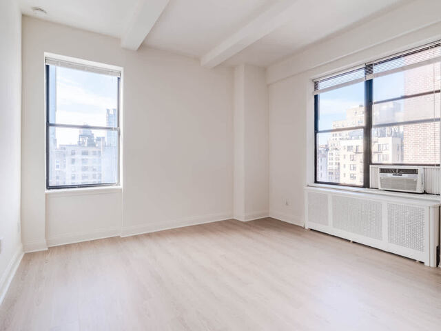 Studio Living Room with Hardwood Floors