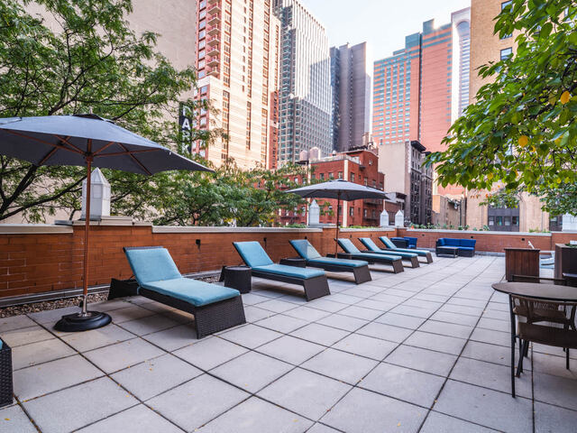 Outdoor Terrace with Grills and City Views