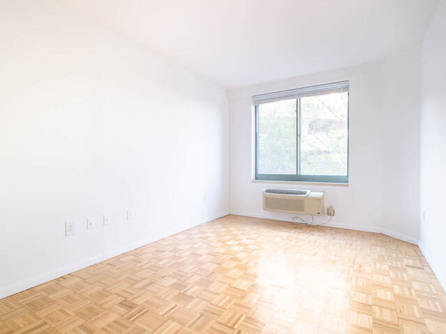 Bedroom with Parquet Flooring