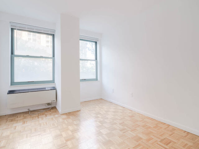 Bedroom with Parquet Flooring