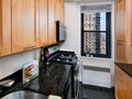 Kitchen with Granite Countertops and Maple Cabinetry