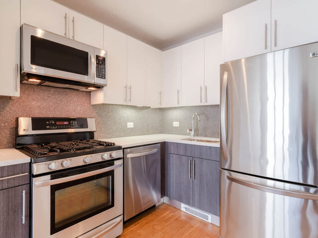 Kitchen with Gas Stove and Stainless Steel Appliances