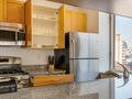 Kitchen with Granite Countertops and Stainless Steel Appliances