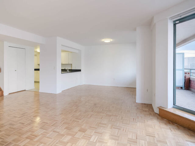 Living Room with Balcony and Parquet Flooring
