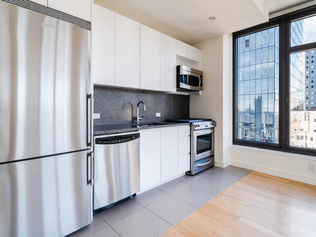 Kitchen with Granite Countertops and Stainless Steel Appliances