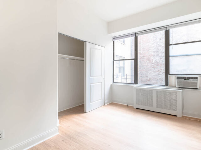 Bedroom with Hardwood Floors
