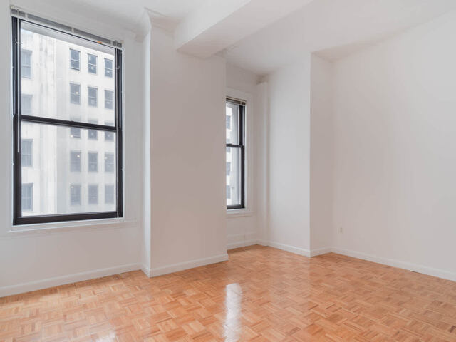 Bedroom with Parquet Wood Flooring