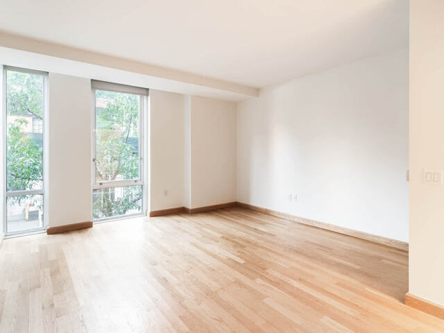 Studio Living Area with Floor-to-Ceiling Windows
