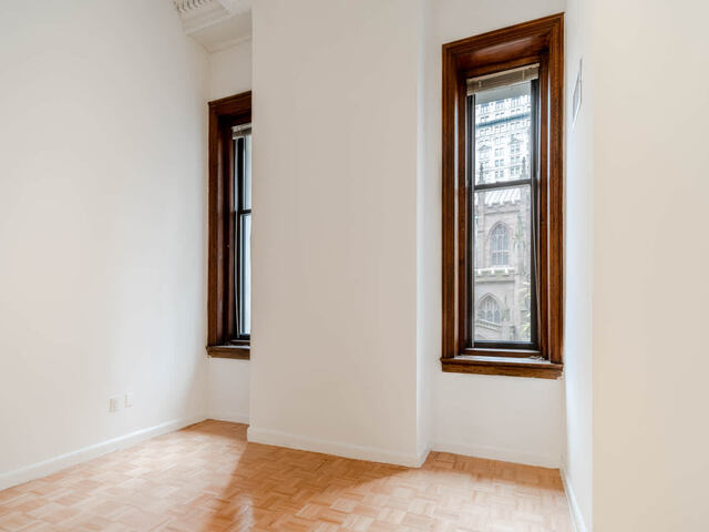 Bedroom with Parquet Wood Flooring