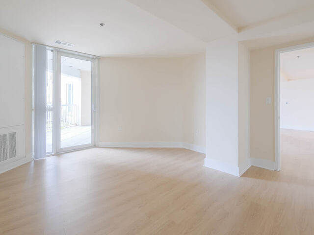 Bedroom with Balcony and Hard Surface Flooring