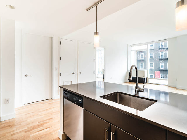 Kitchen with Quartz Countertops and Stainless Steel Appliances