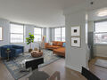 Pass-through Kitchen and Living Room with Hard Surface Flooring