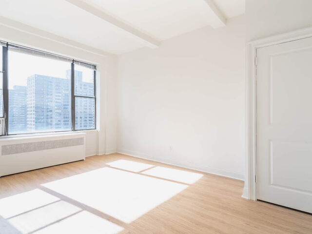 Studio Living Room with Hardwood Floors
