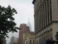 Central Village. Sixth Avenue and 13th street. View of the Empire State Building.